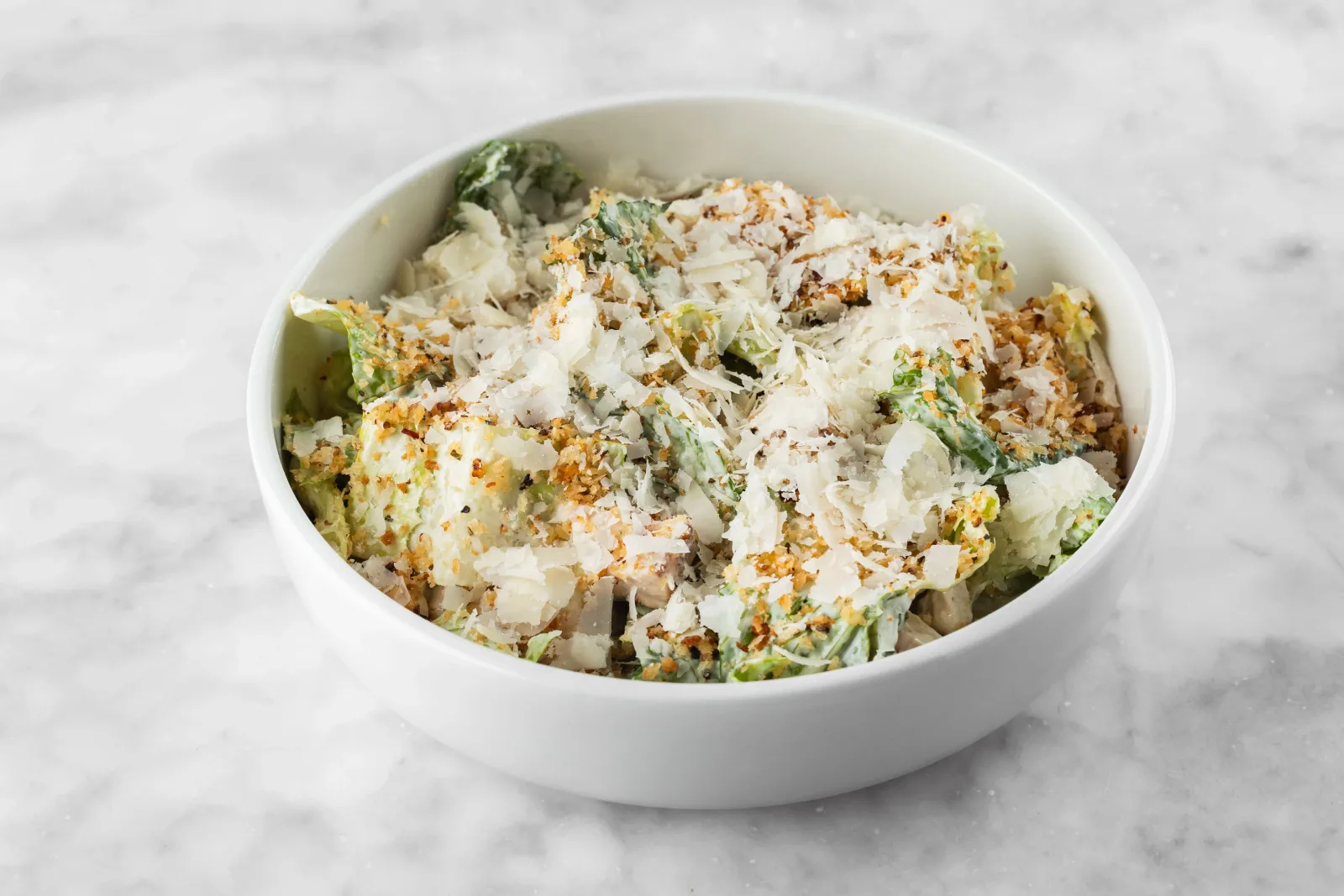 Caesar salad with shaved parmesan