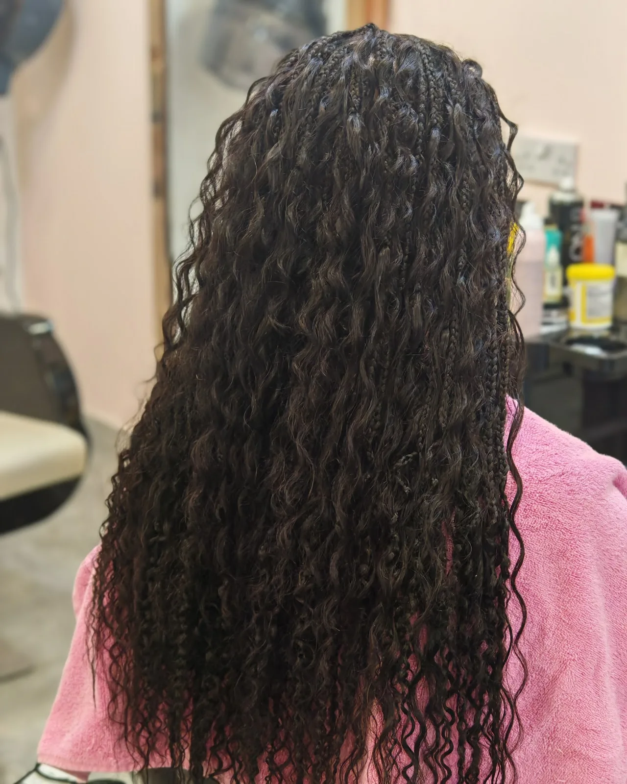 Boho braids with curly texture