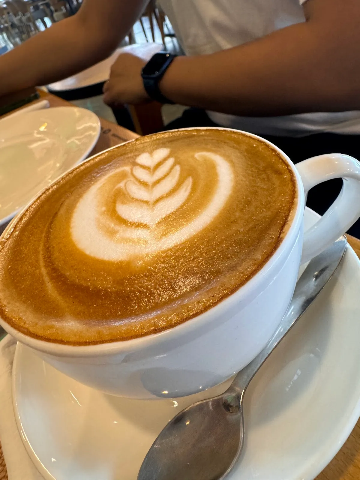 Cappuccino with latte art at Hashtag Cafe & Restaurant