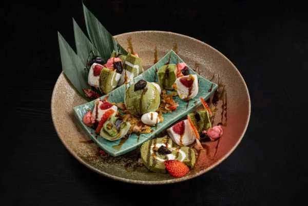 Matcha ice cream dessert plate with berries