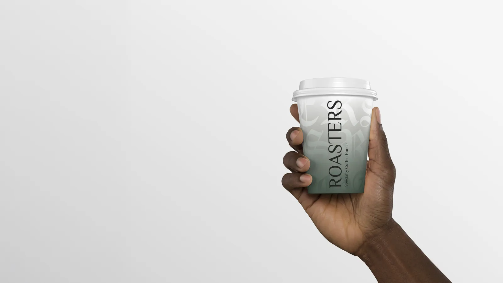 Hand holding a branded Roasters Specialty Coffee House takeaway cup