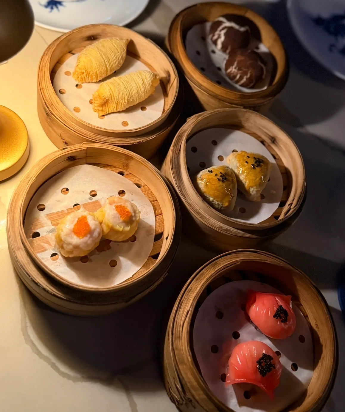 Steamer baskets of dumplings and dim sum