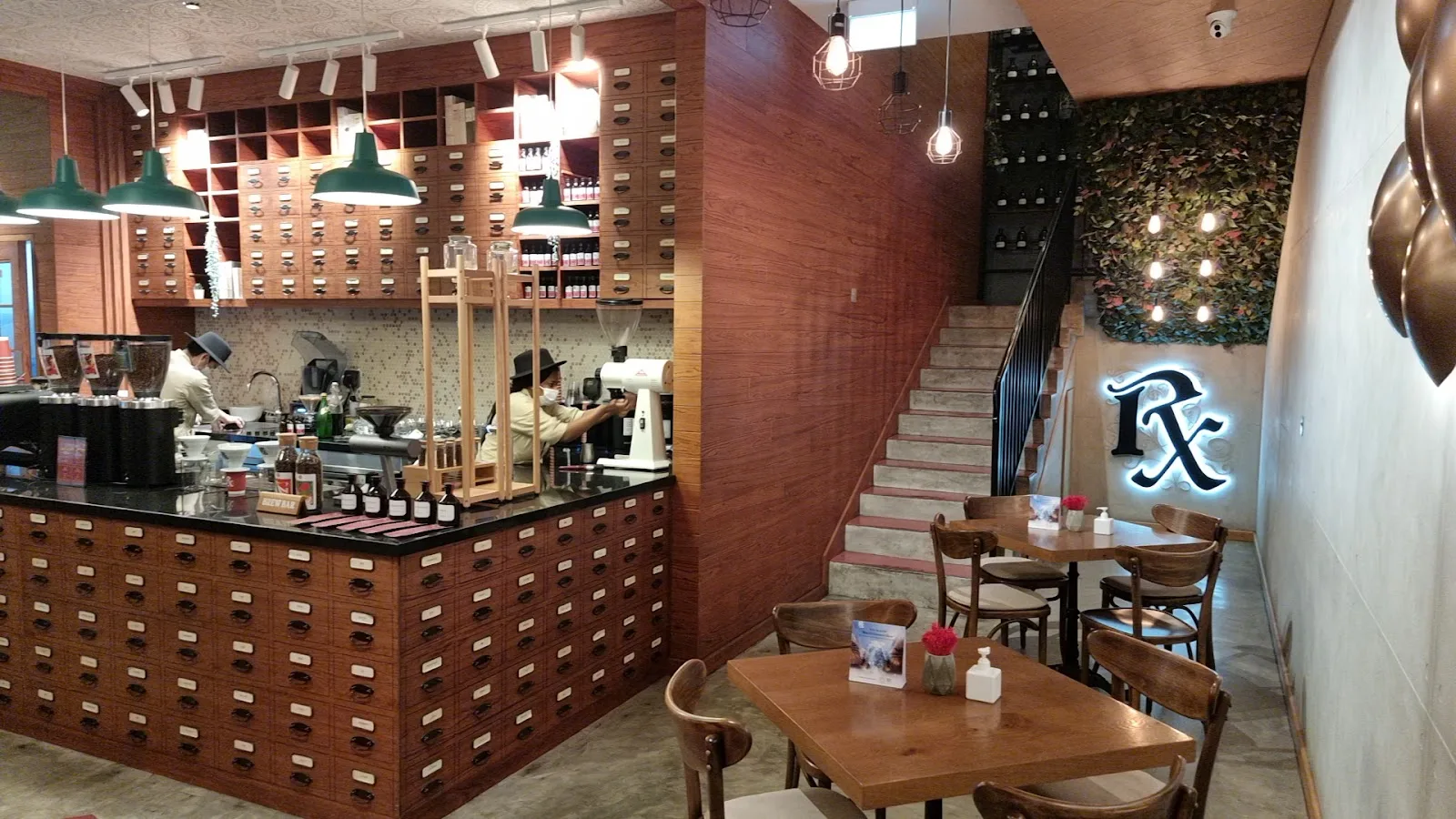 Barista preparing coffee at the apothecary brew bar