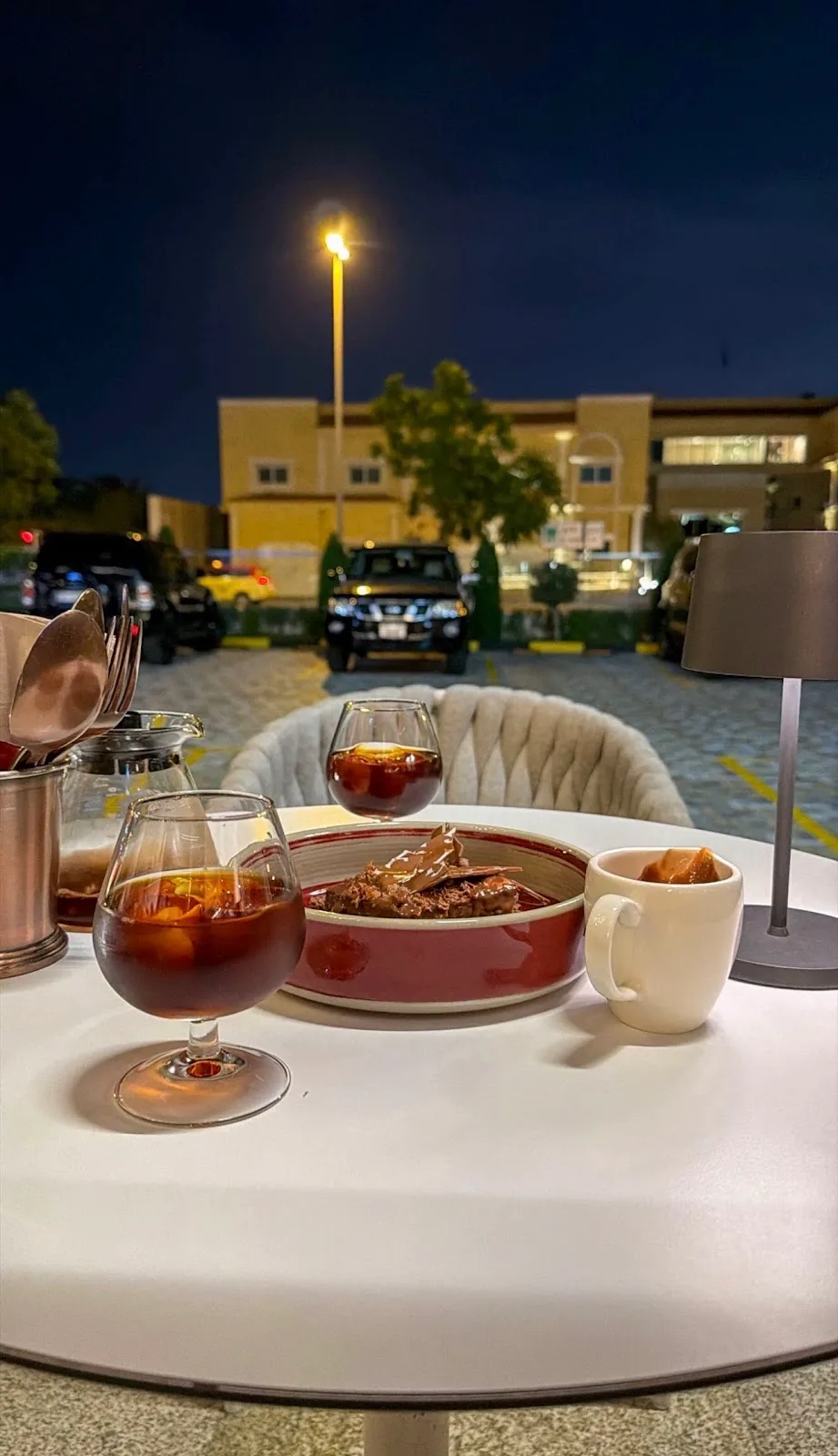 Evening coffee and dessert served on an outdoor table
