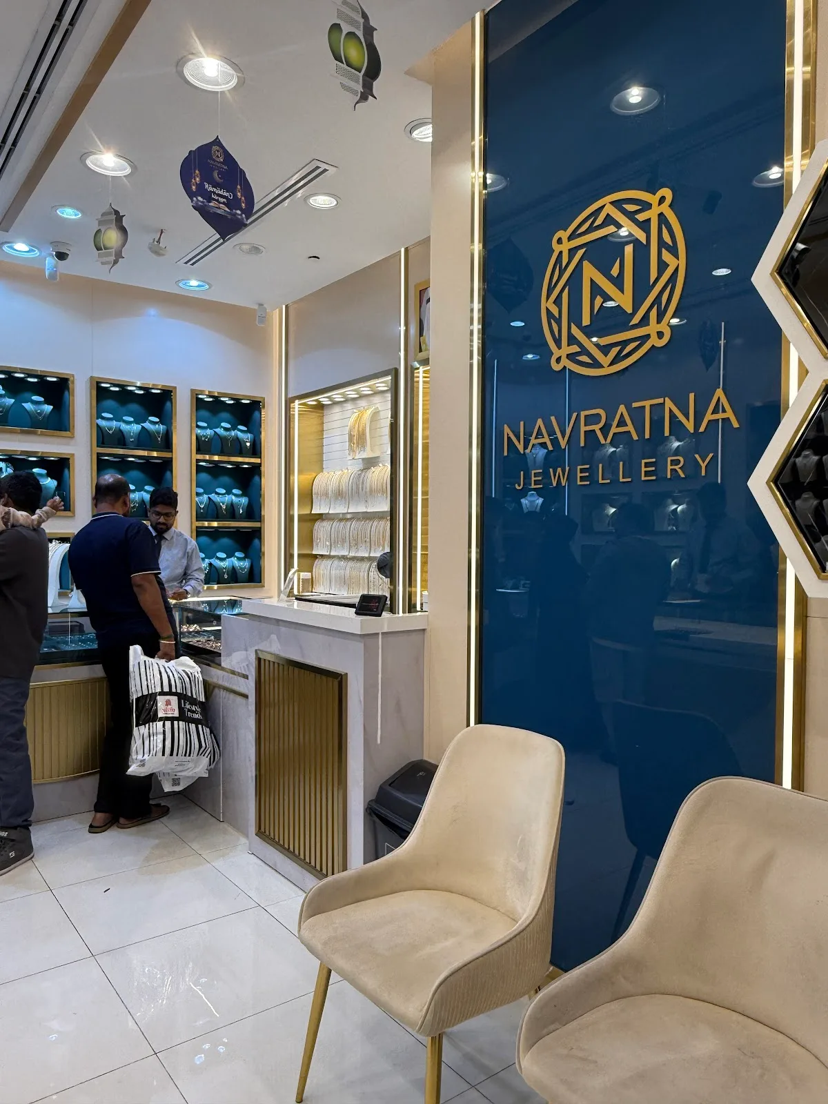 Interior of the Navratna Jewellery showroom in Al Nahda 2 with display counters and seating