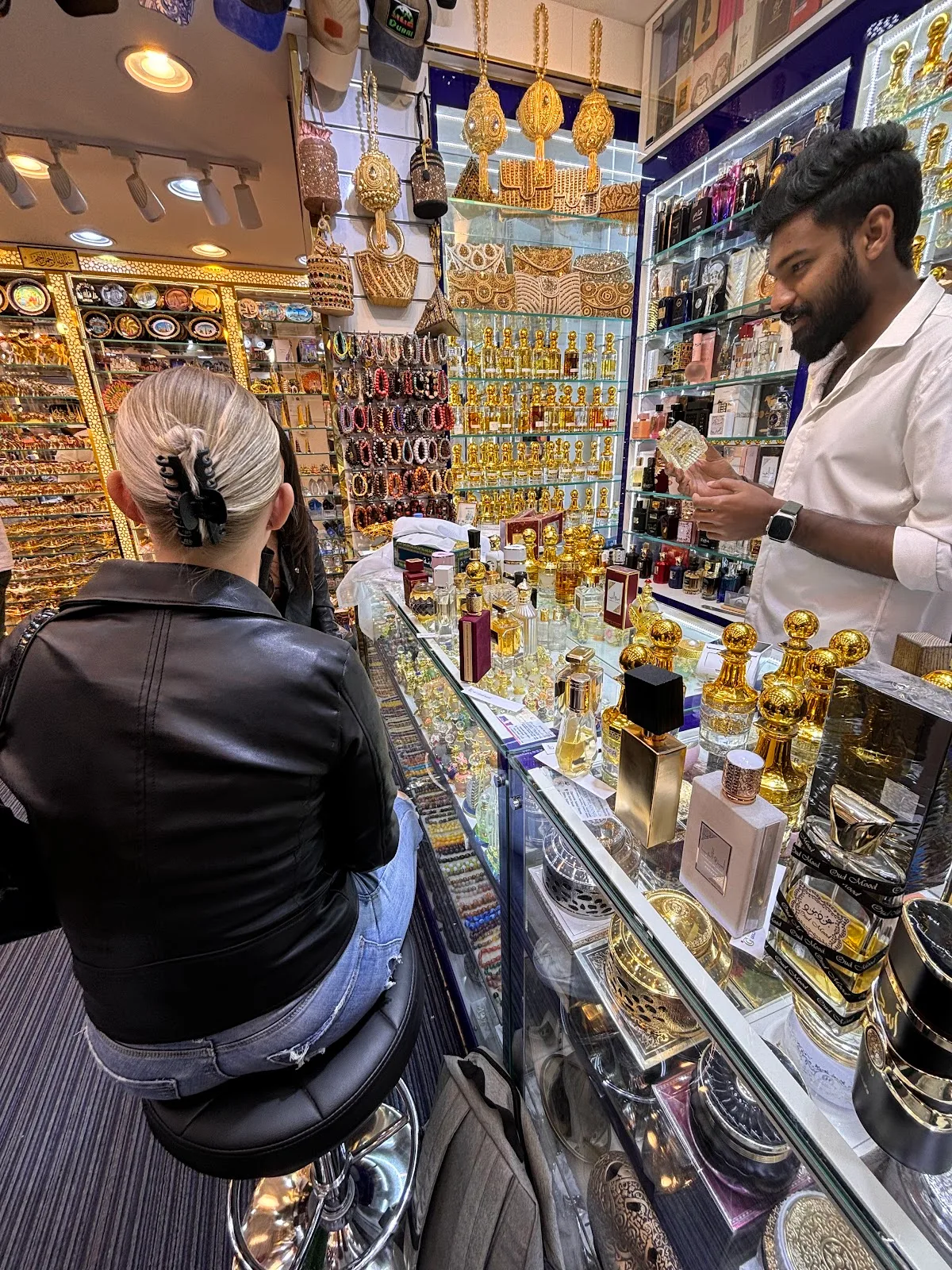 Tins of dried botanicals, resins and frankincense at a Deira souk stall