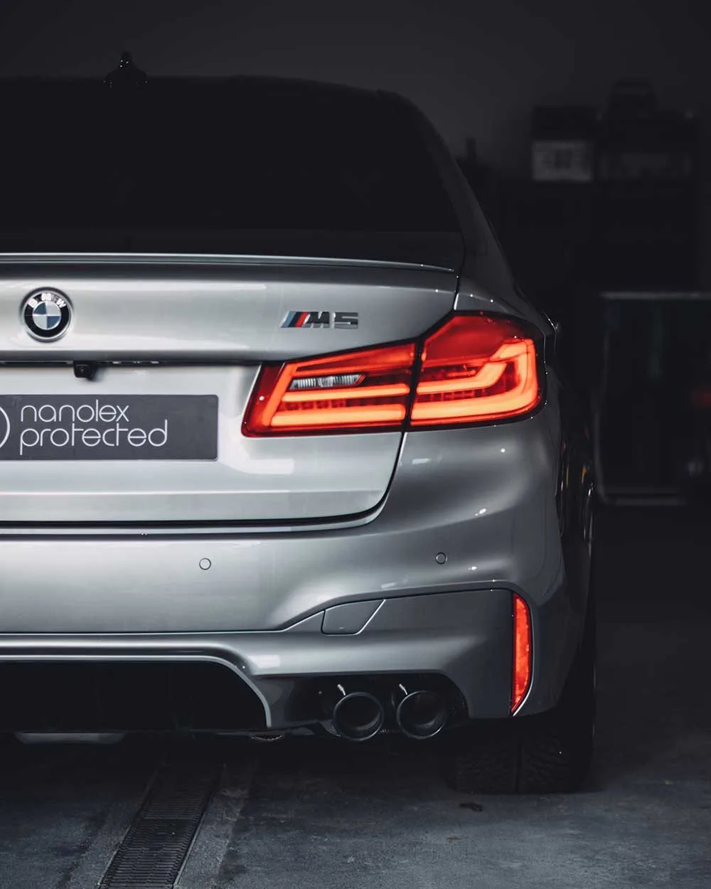 Silver BMW M5 rear detail at Crystal Shine Car Care