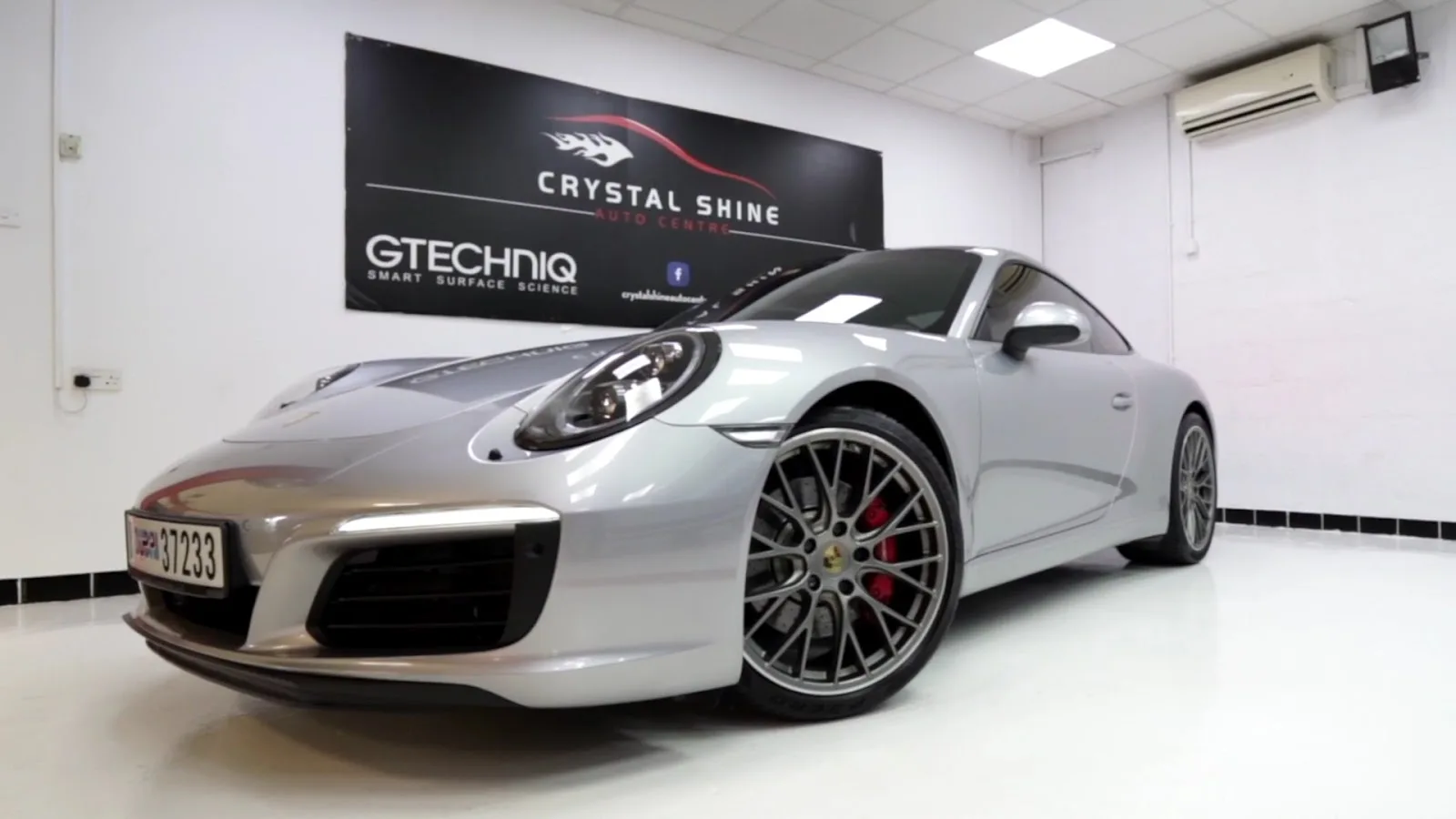 Silver Porsche 911 detailed at Crystal Shine Car Care