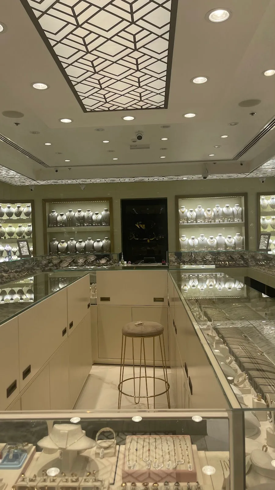 Lit display cases of rings and fine jewellery