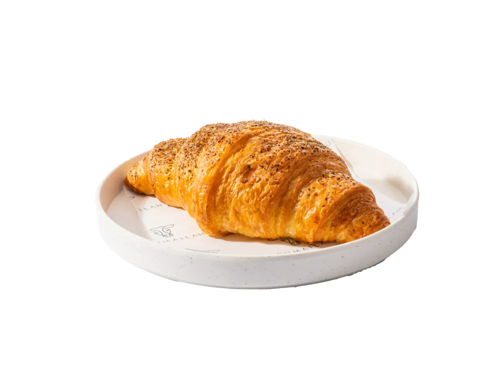 Za'atar croissant on a Rumailah plate