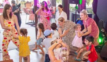 Children enjoying entertainment at a family event