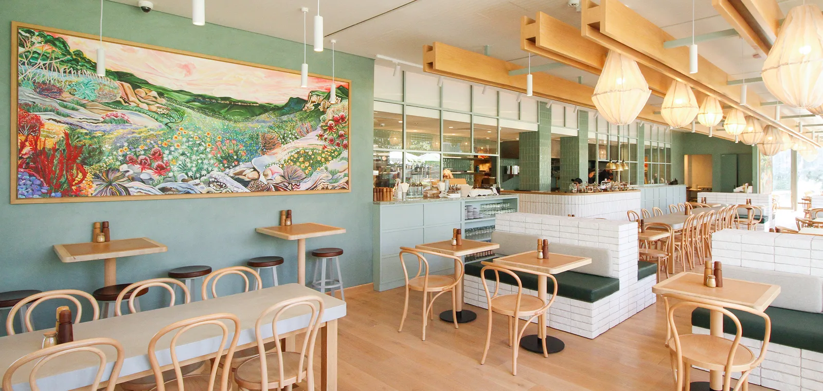 Wide view of the dining room with banquette seating