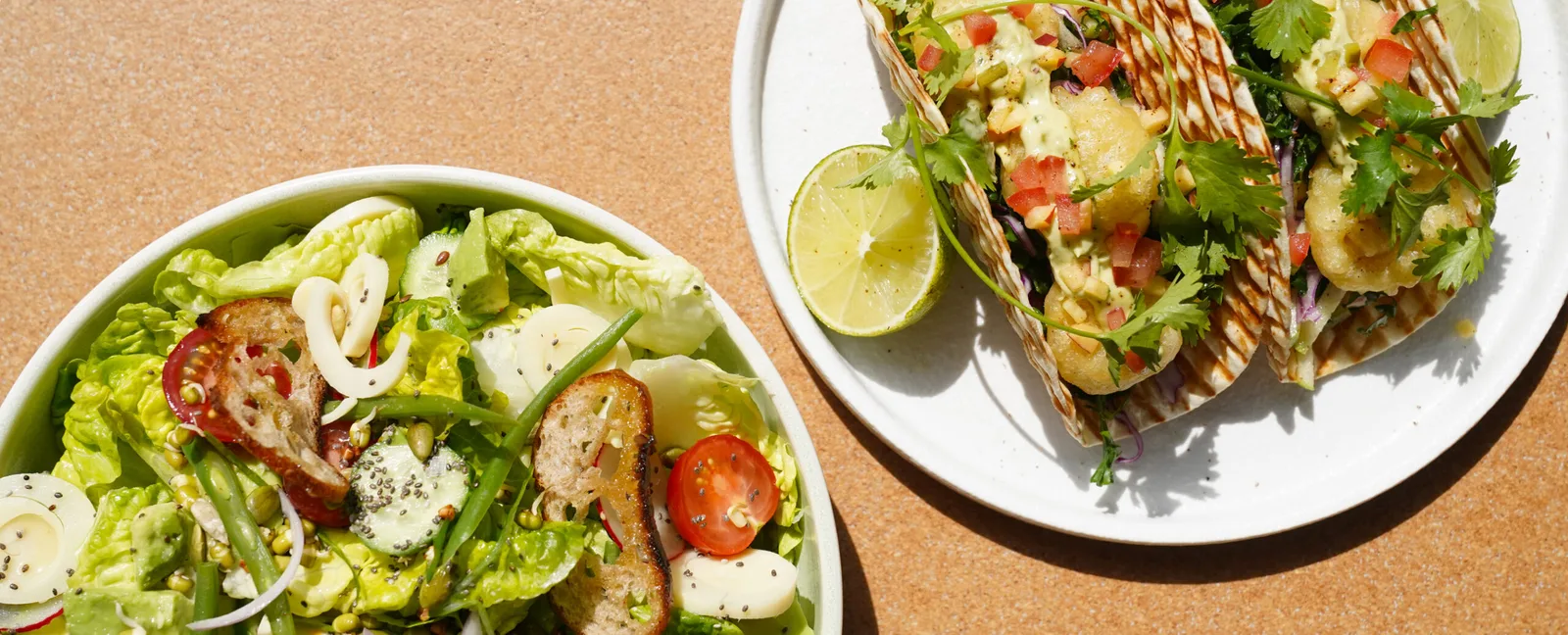 Garden salad bowl and tacos