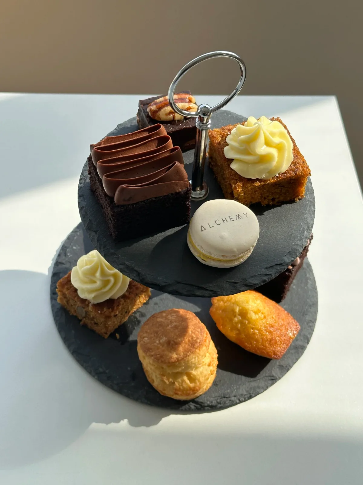 Afternoon tea tier stand in golden sunlight