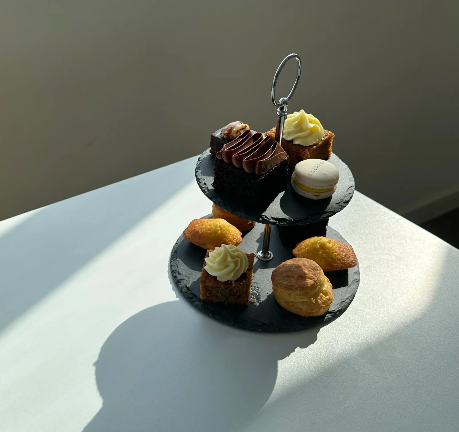 Two-tier afternoon tea stand of pastries