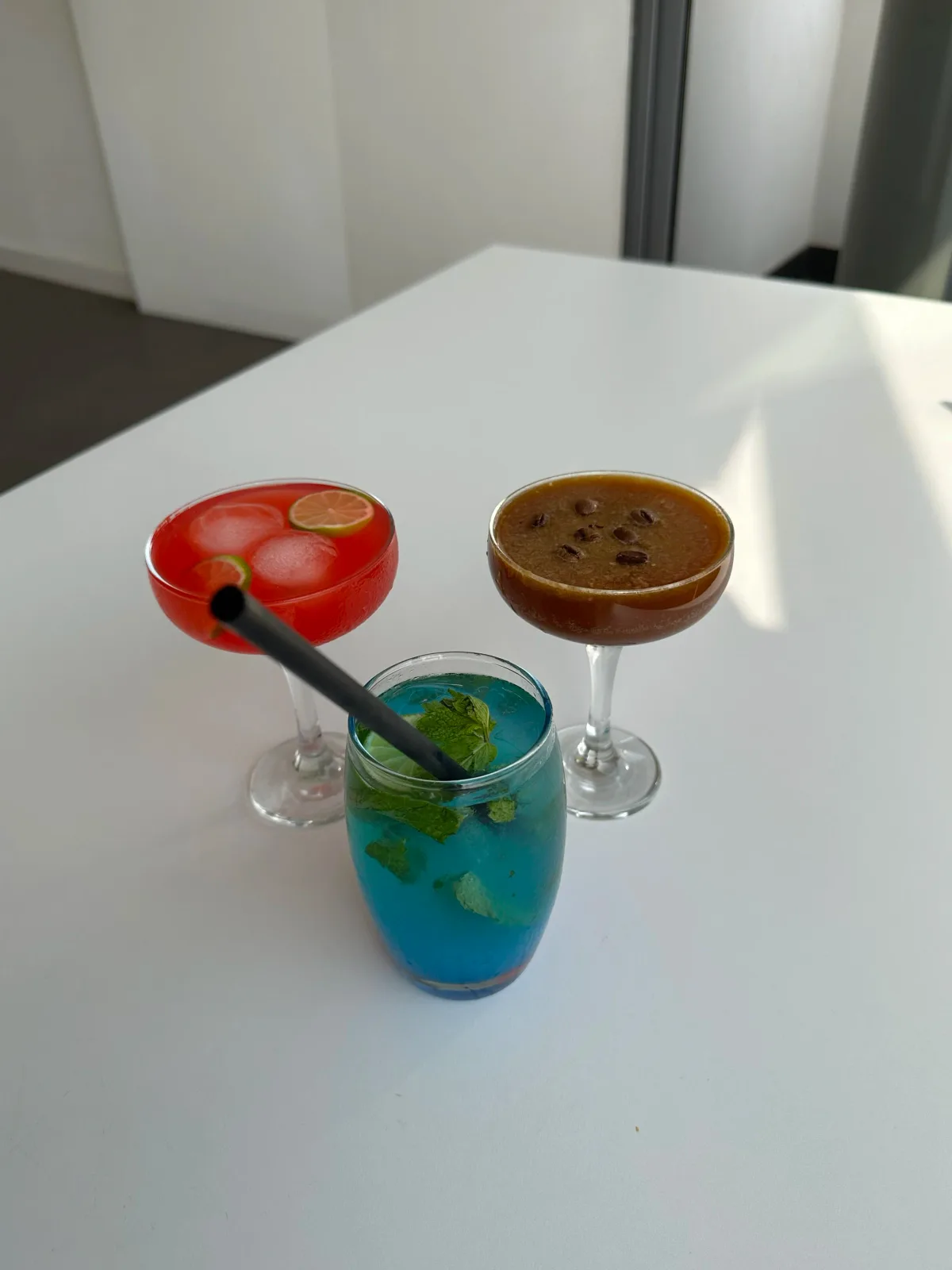 Colourful signature drinks on a table