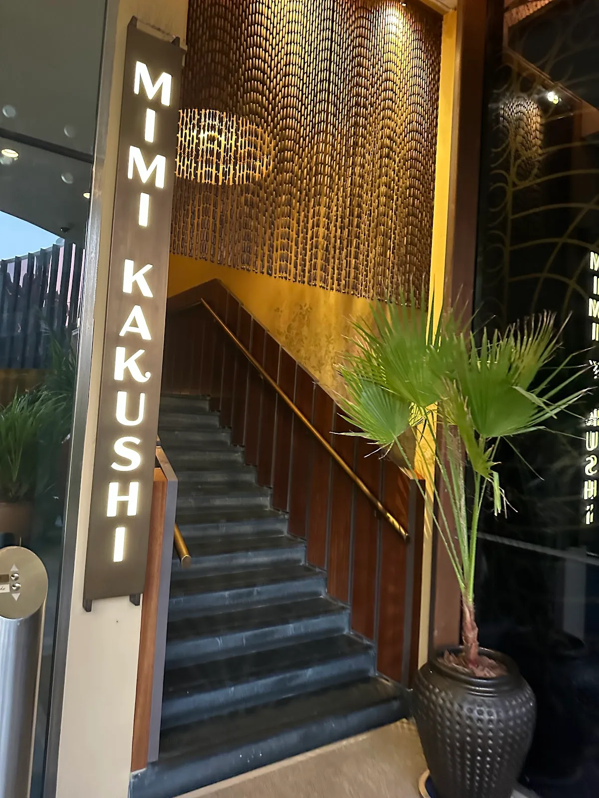 The illuminated Mimi Kakushi entrance staircase