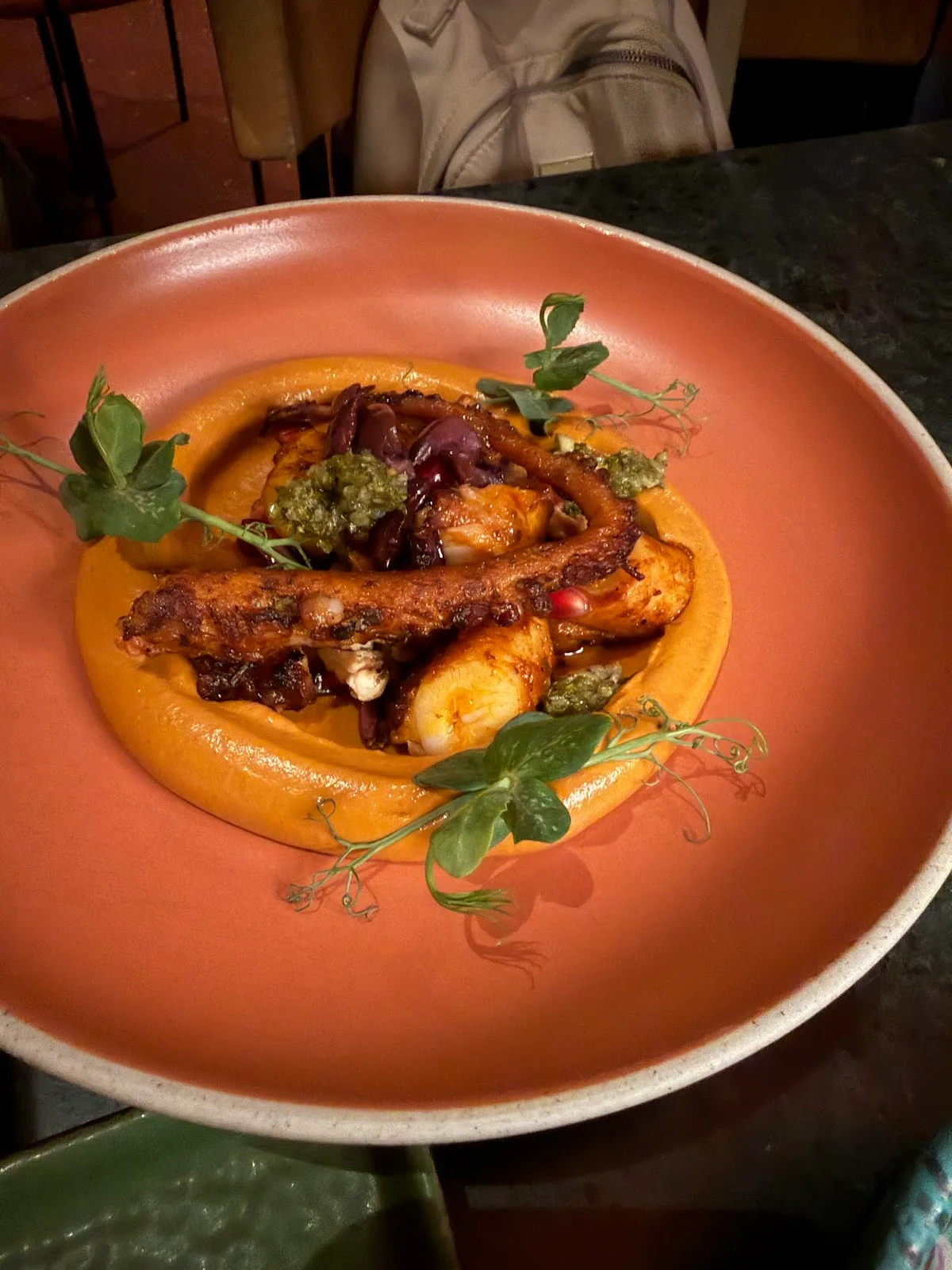 Grilled octopus over a romesco-style purée