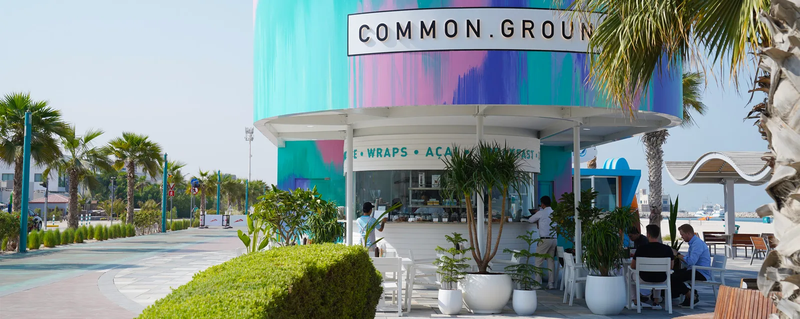 The painted café façade seen from the boardwalk