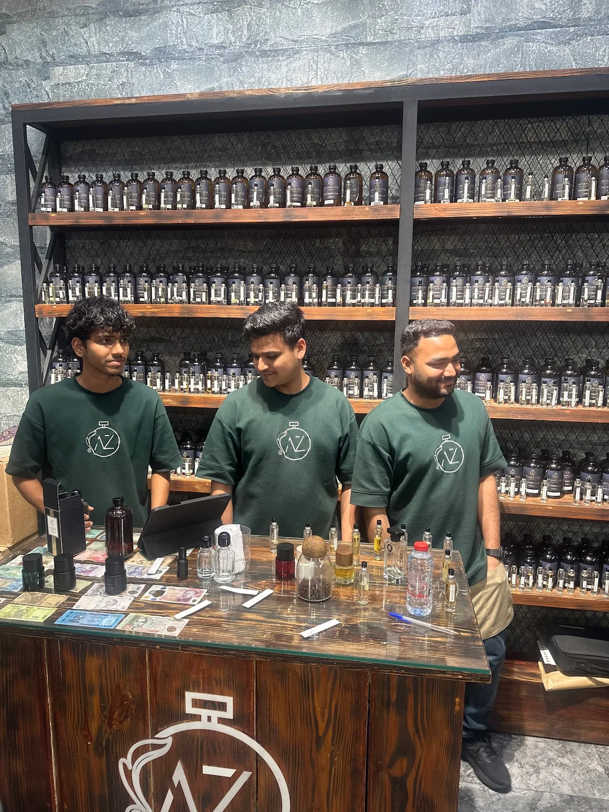 Amanzada team members behind the store counter