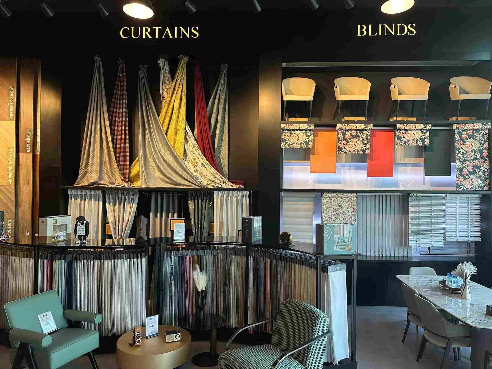 Inside the Blinds And Curtains Dubai showroom with curtain and blind displays