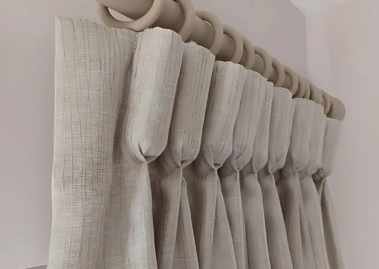 Beige pleated sheer curtain heading detail