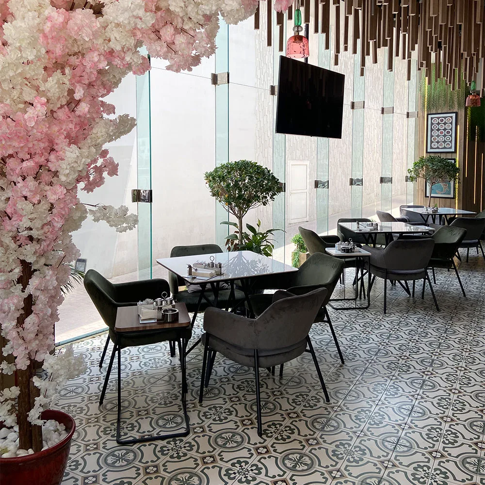 Seating beneath a cherry-blossom canopy at Nargileci Eleven Cafe