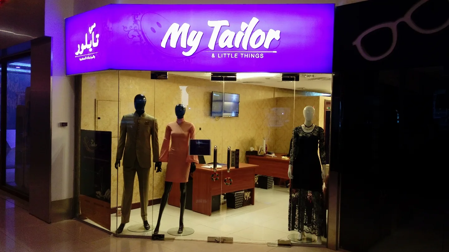 The My Tailor & Little Things storefront with mannequins in the window