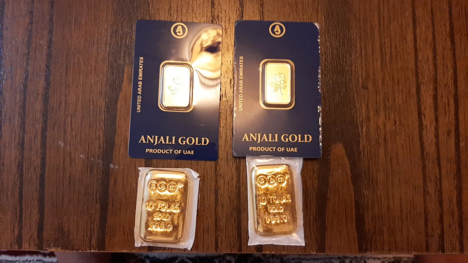 Anjali Gold certificate cards and ten-tola gold bars