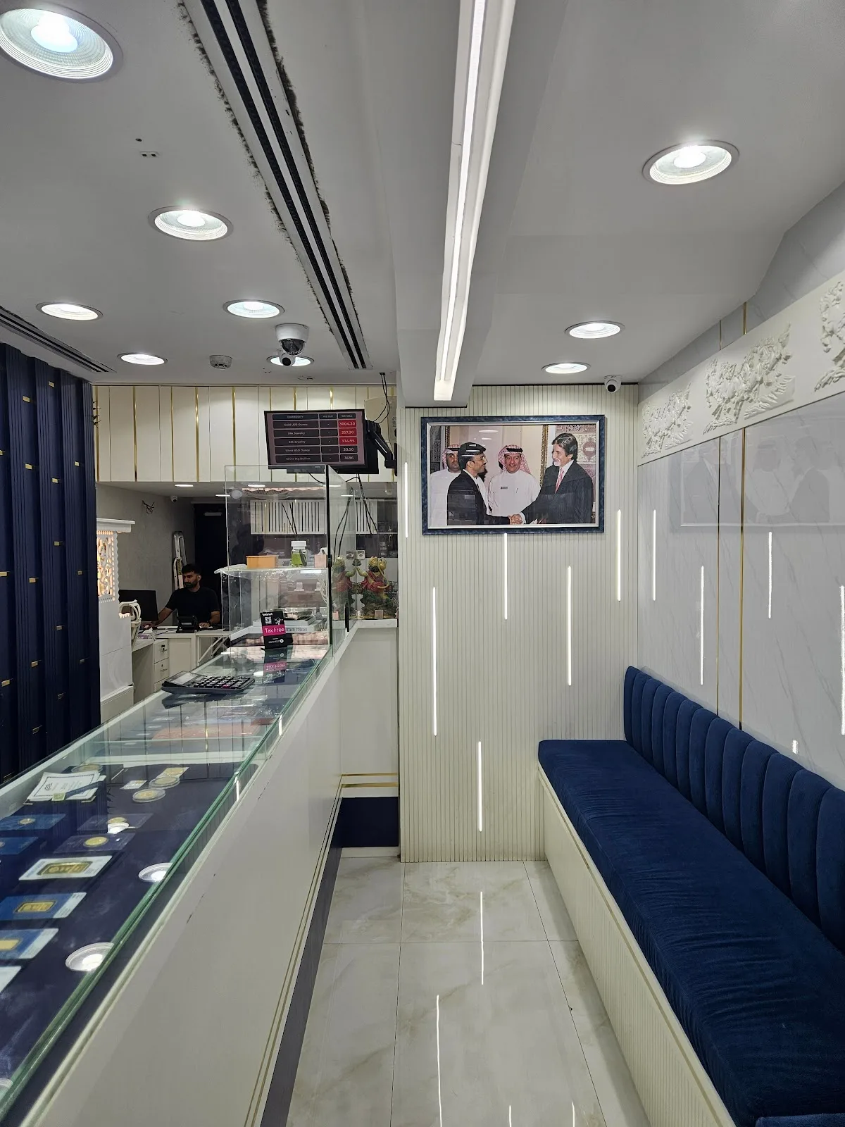 Interior of Anjali Jewellers showing the display counter, seating and signage