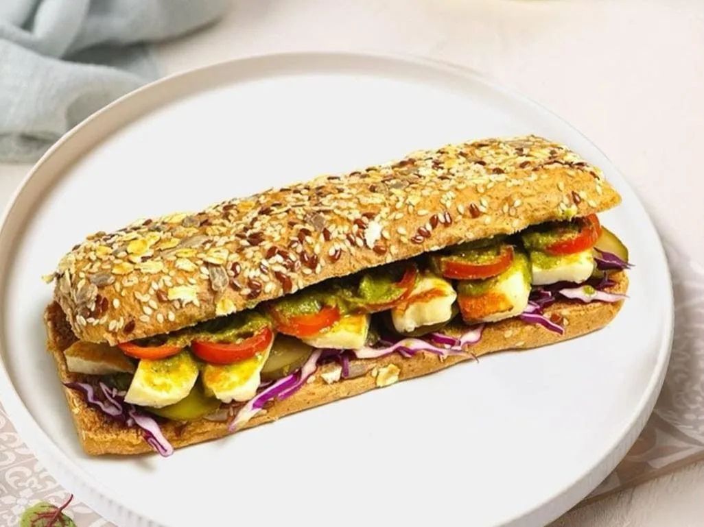 A grilled halloumi sandwich on seeded bread