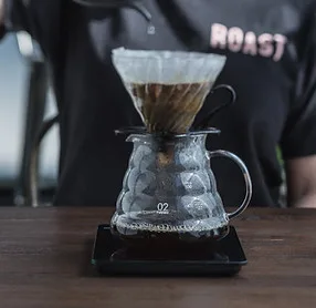 Pour-over coffee being brewed through a filter