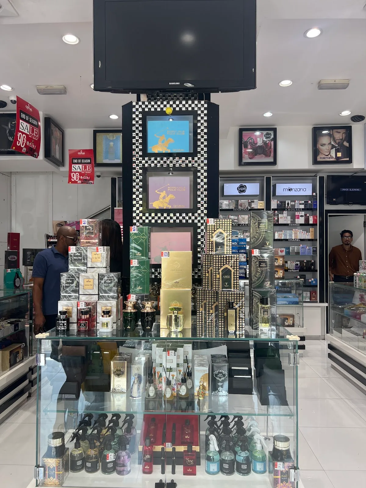 In-store display tower at Coral Perfumes