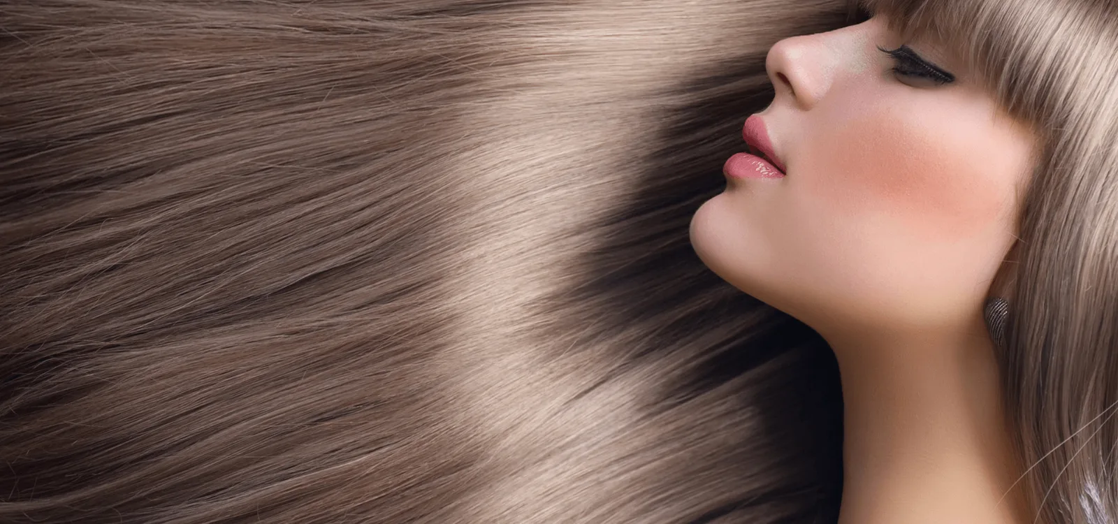 Close-up of glossy, healthy hair styled at the salon