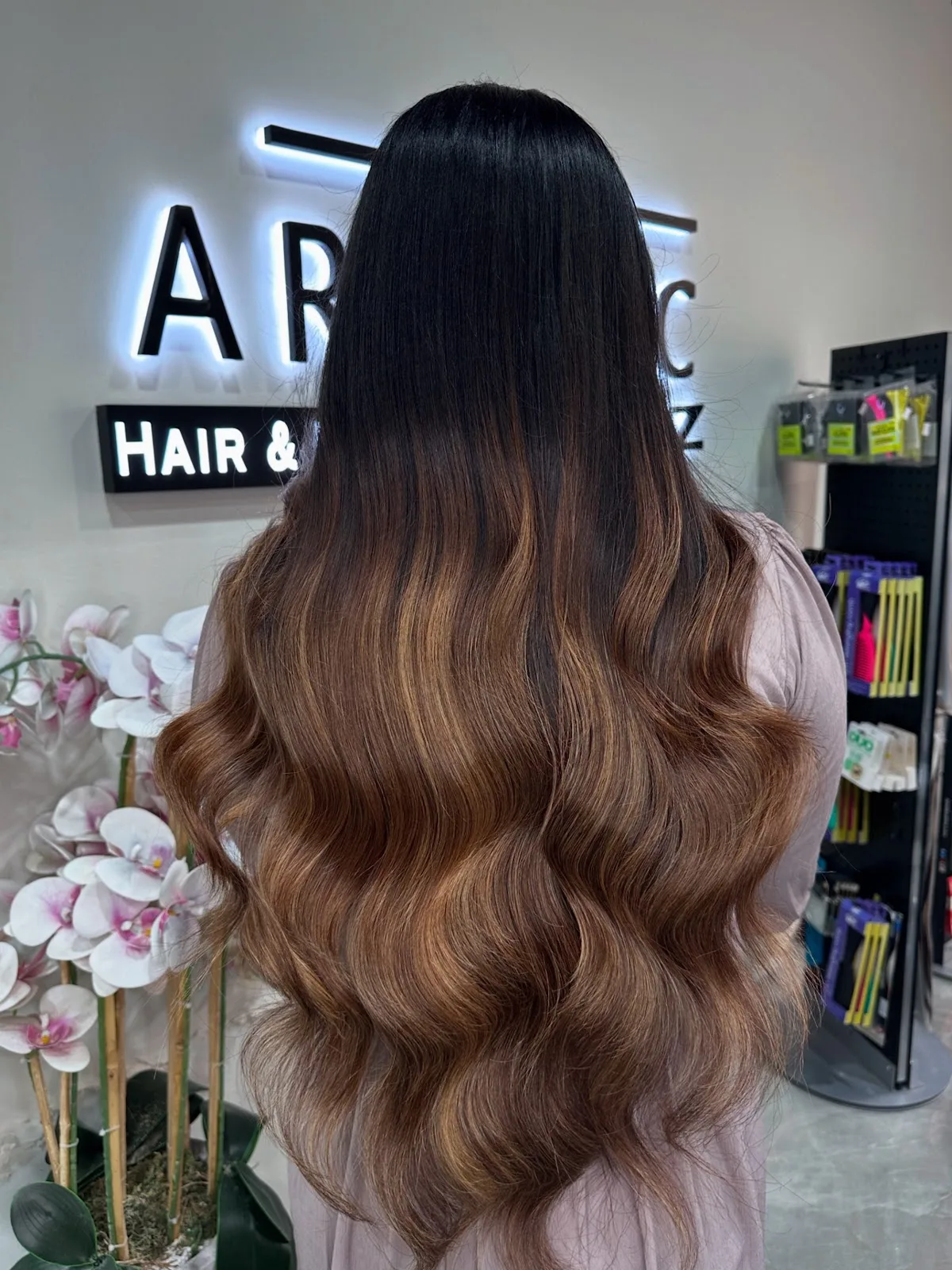Long balayage hair coloured at the salon