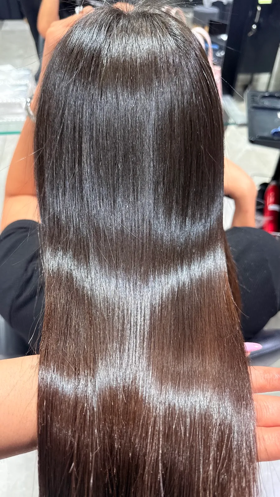 Shiny straight hair after a gloss treatment