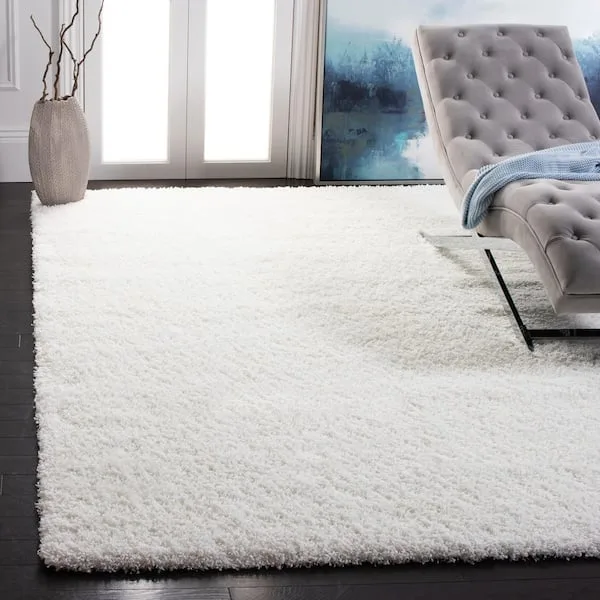 Plush white area rug in a styled living space