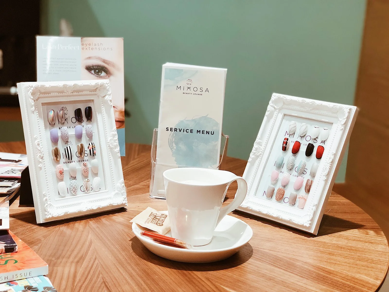 Service menu and nail samples on display