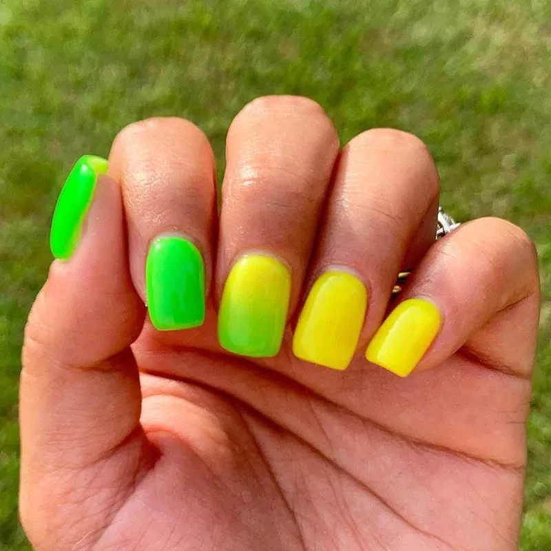 Bright green and yellow ombre nails
