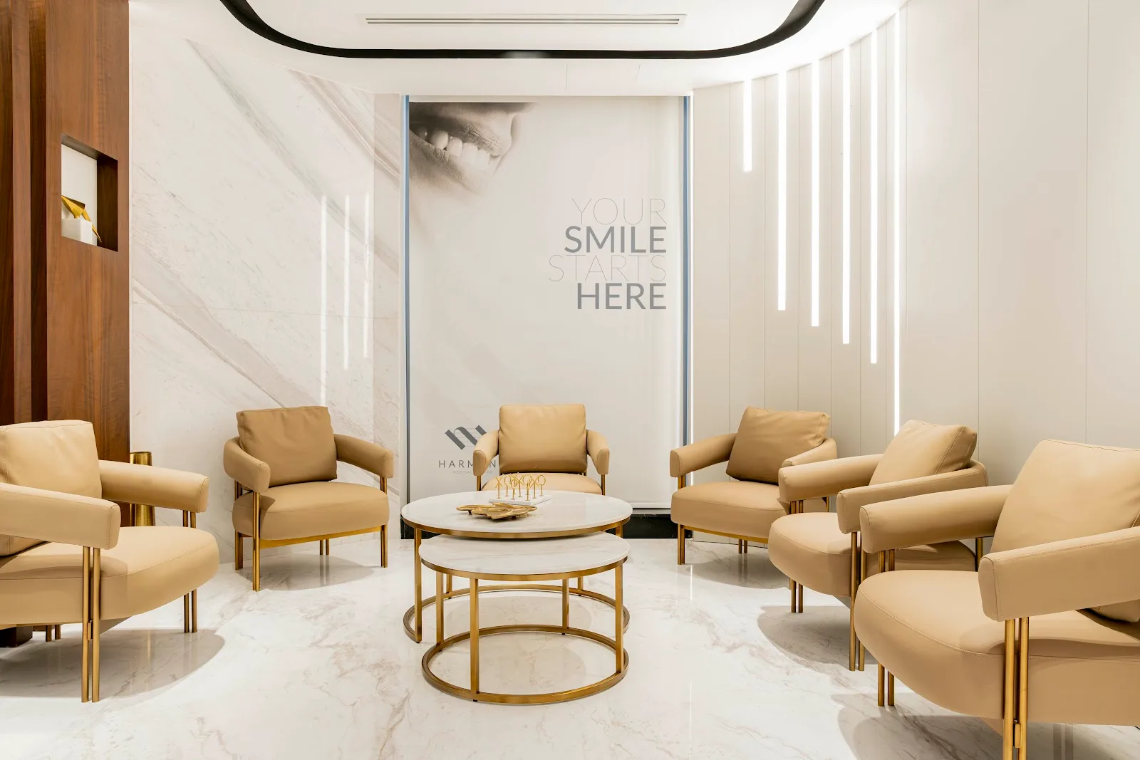 Waiting lounge with beige and brass armchairs