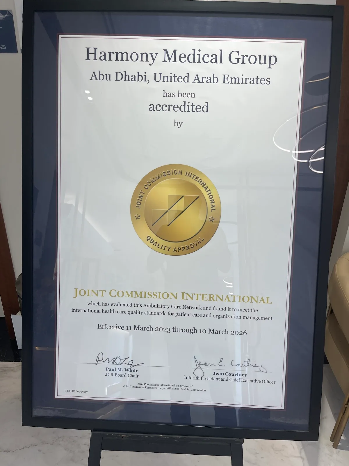Framed Joint Commission International accreditation certificate for Harmony Medical Group