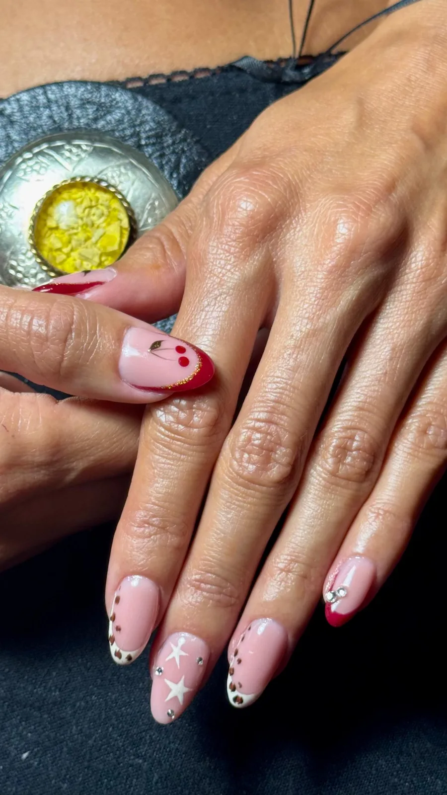 Almond nails with red and star art
