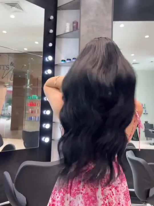 Blow-dry with soft curls at the mirror