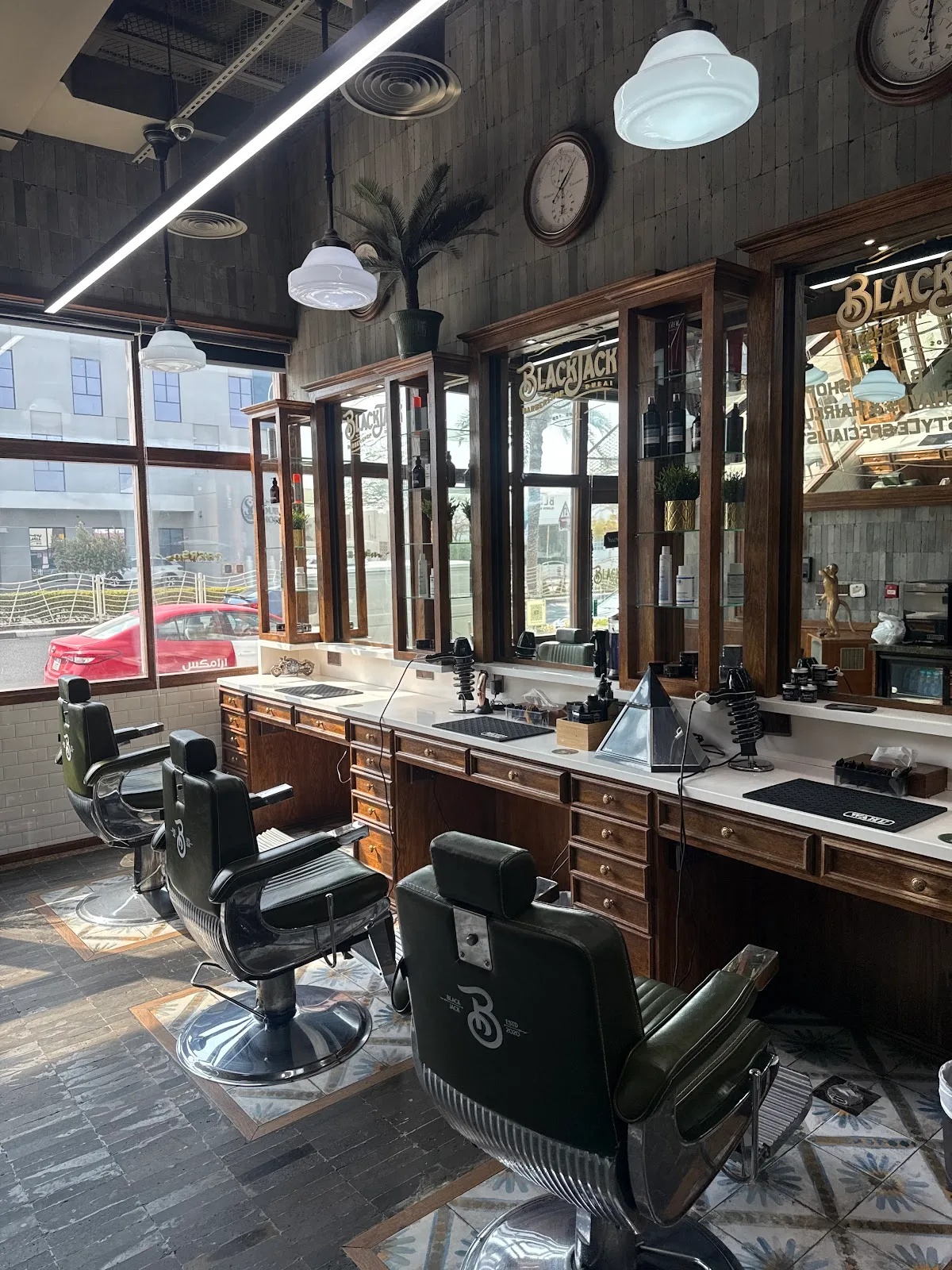 Vintage interior of Black Jack Barber Shop with wooden cabinets and barber chairs