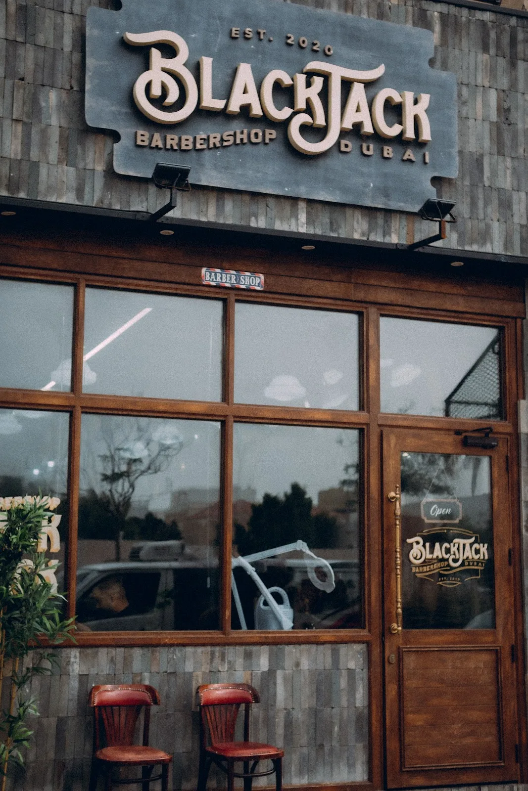 Black Jack Barber Shop storefront with vintage signage in Dubai