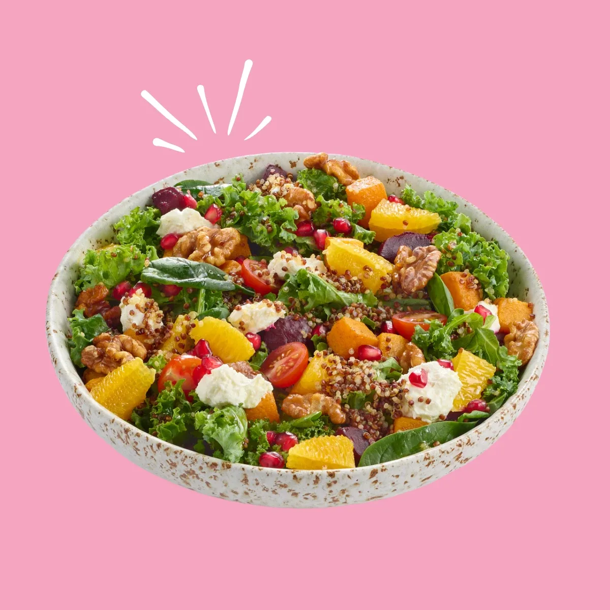 Superfood salad bowl with kale, quinoa, orange, walnuts and feta