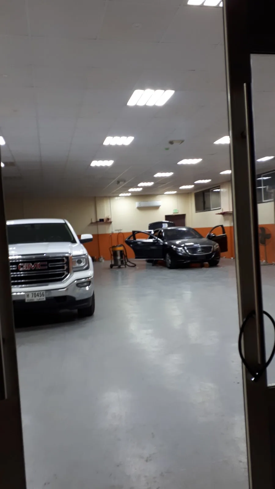 Vehicles inside the detailing hall