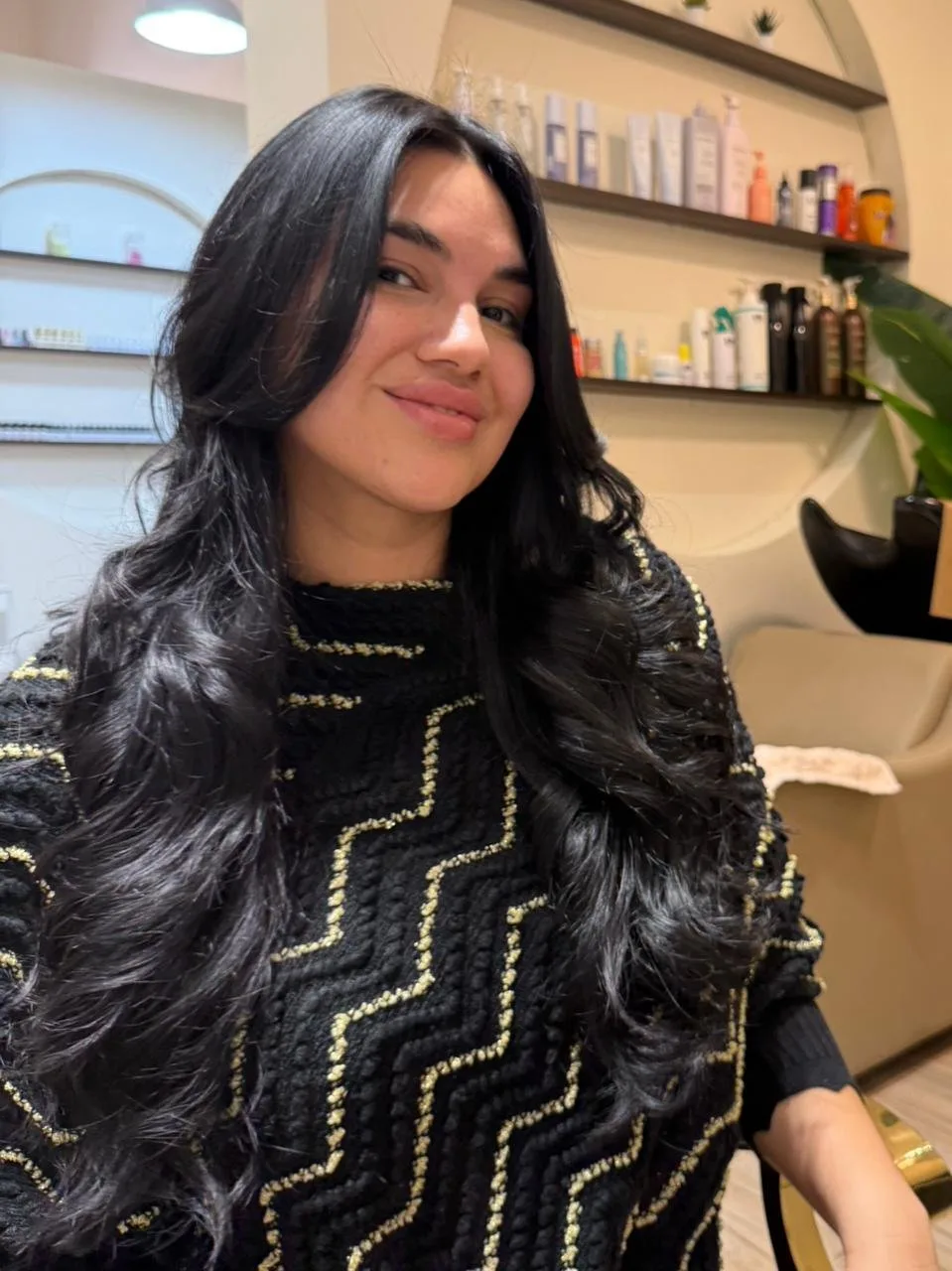 Client with glossy, freshly styled long hair at Incoco Style