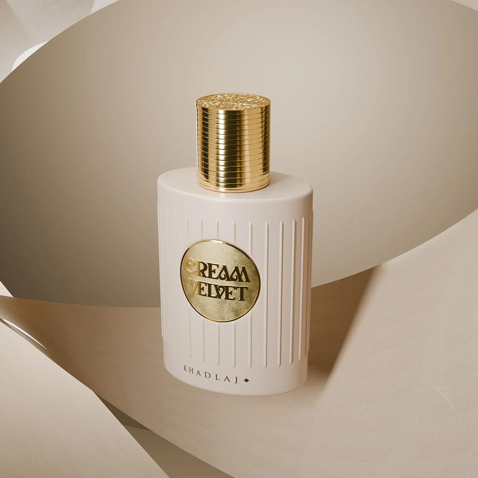 A cream and gold Khadlaj perfume bottle