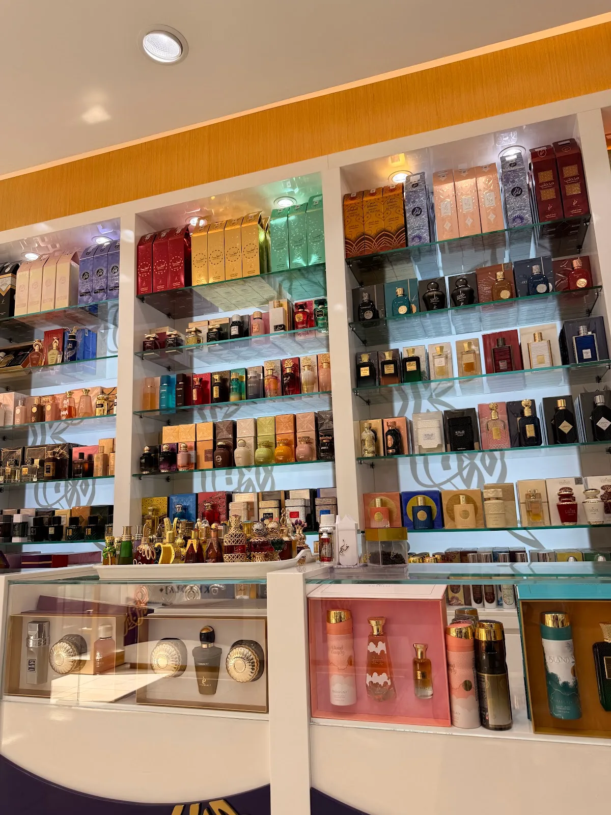 Colourful shelves of perfume boxes inside the Khadlaj showroom